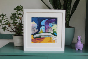 Framed Irish abstract art in situ with blue yellow purple pink and white by Irish artist Martina Furlong